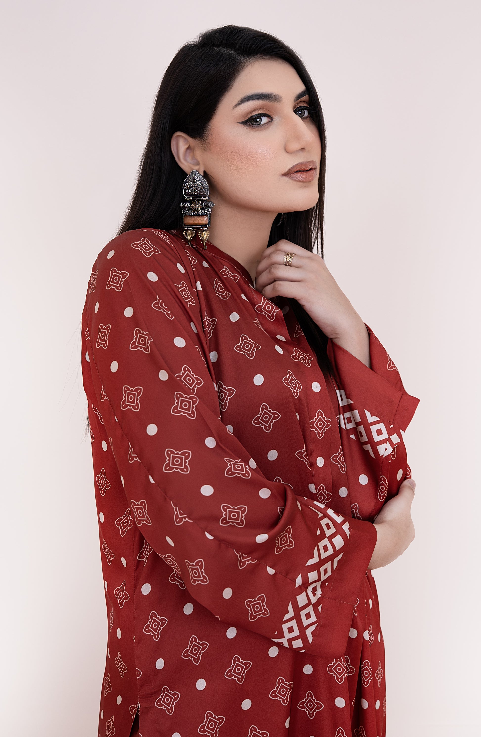 Woman wearing Rust Silk Suit 